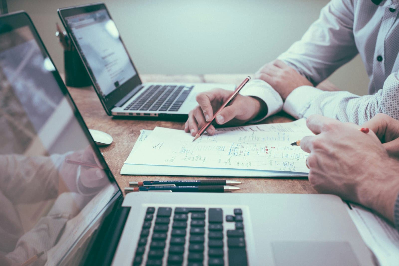 Business meeting to decide bookkeeper versus controller support