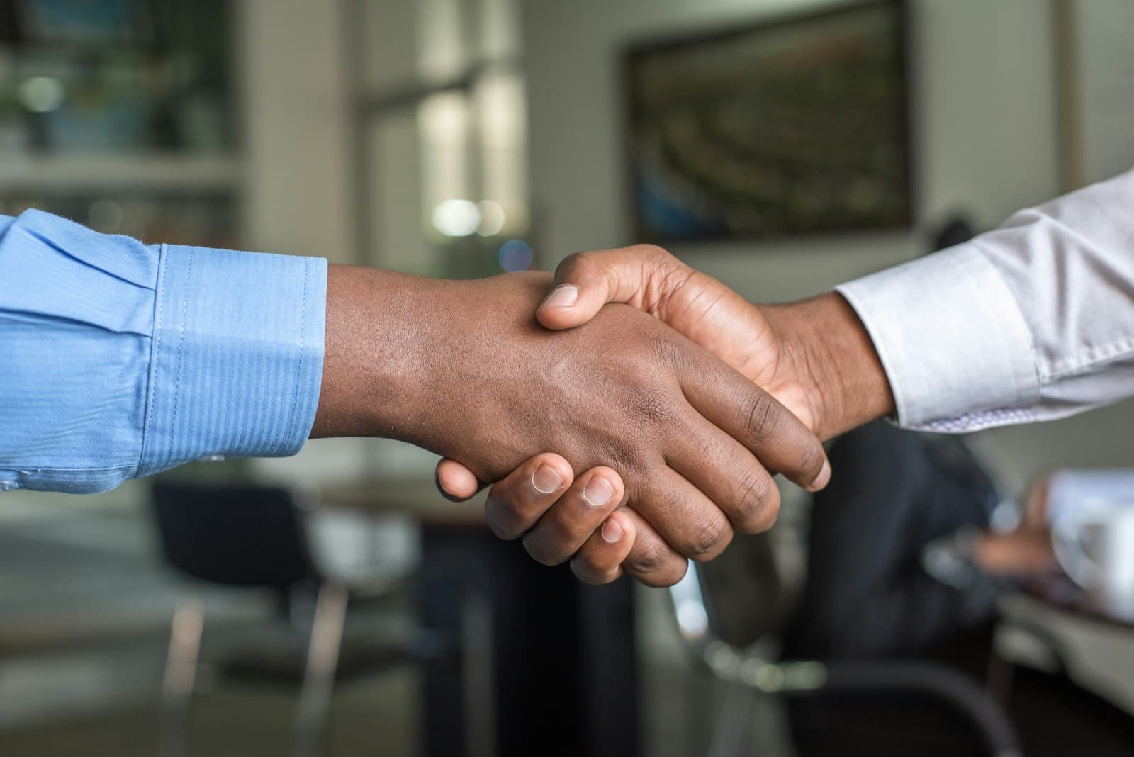 Vendor handshake representing Maplewood accounts payable portals
